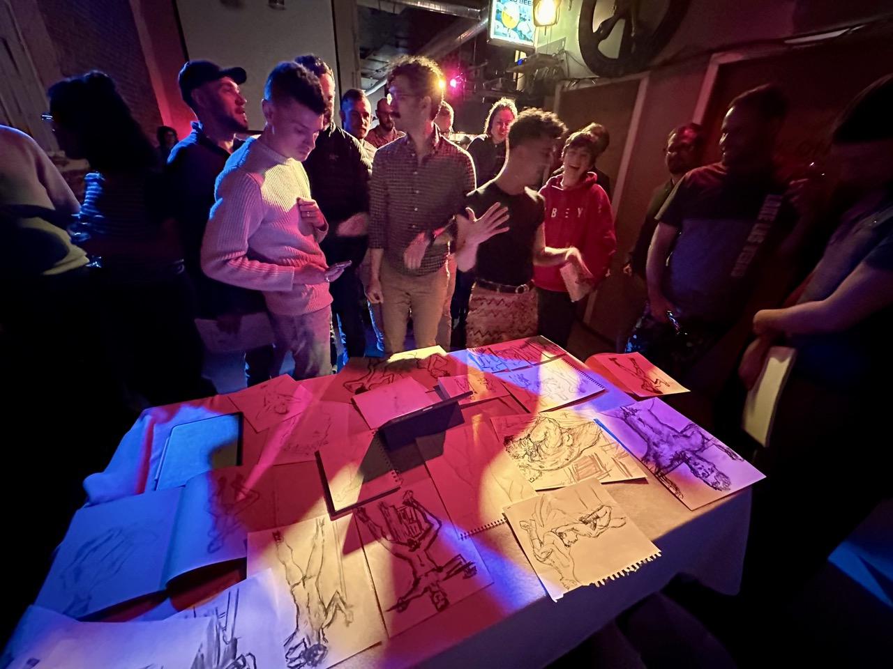 The community sharing their drawings at a Figure It Out event.