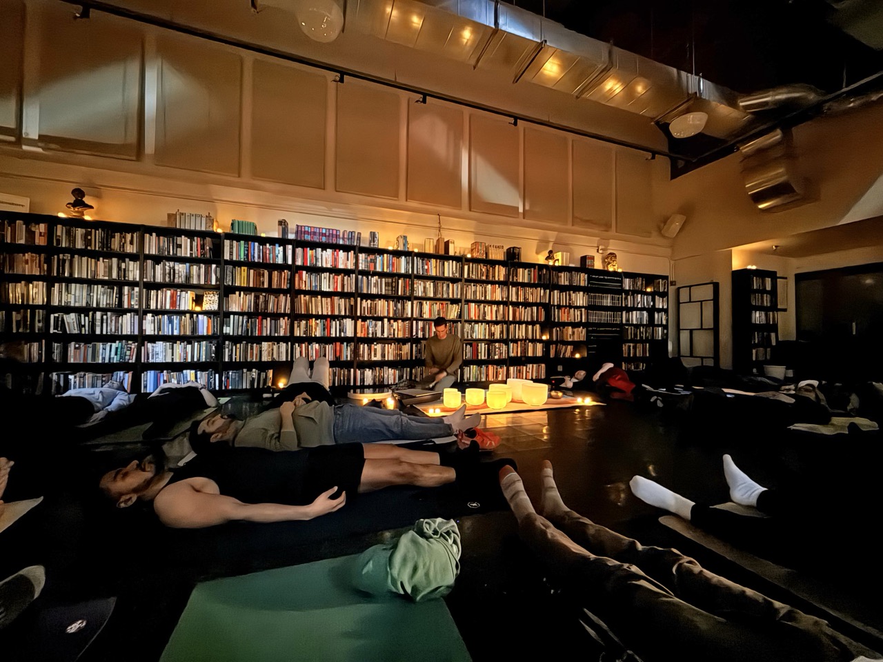 Derek leading a sound bath at a library in Seattle.
